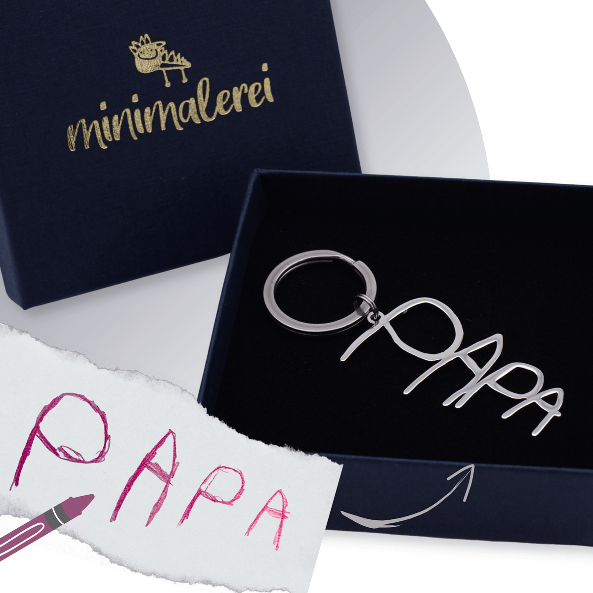 Silberfarbener Schlüsselanhänger mit Handschrift – die echte Handschrift originalgetreu als filigraner Anhänger